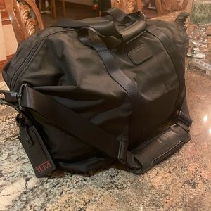 Tumi Carry on 24 x 13 (approximately) Excellent Condition